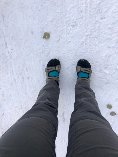 Picture of Zoes socks and sandals in the snow.
