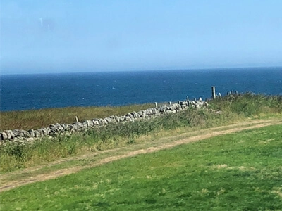 Seaside view from the trainline in Scotland