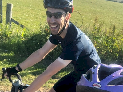 Zoe and Stewart pictured riding bikes to John O Groats