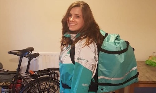 image of Zoe in Deliveroo kit before going to work